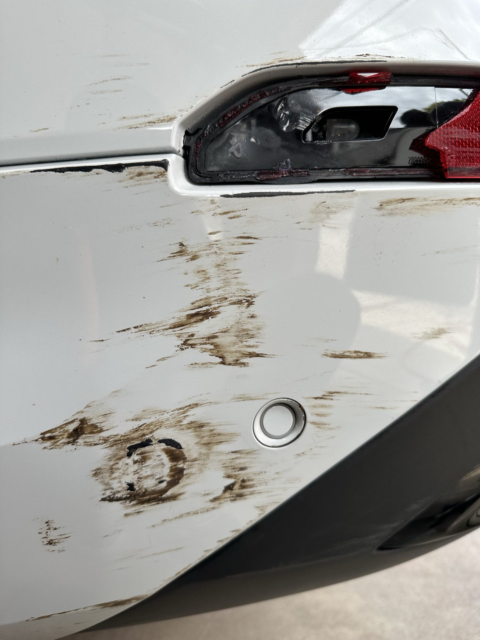 white car with dirty extrior