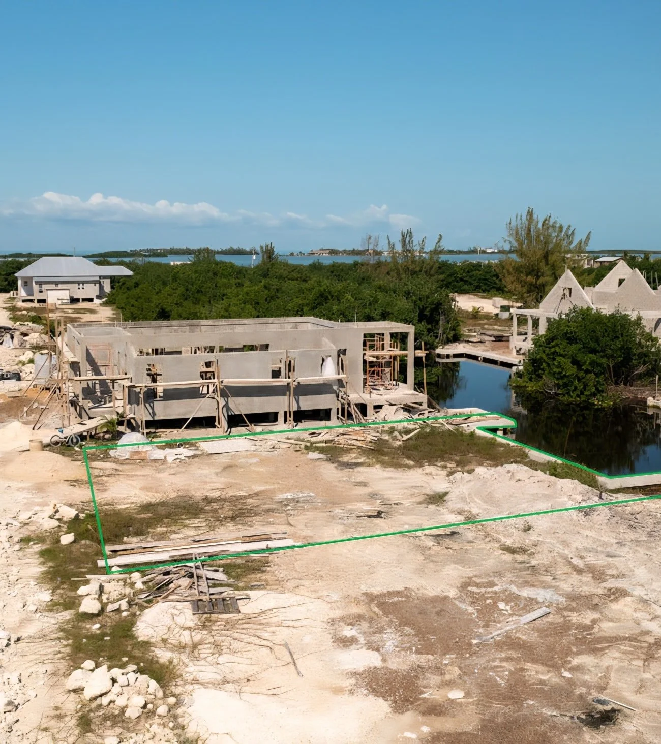 Sea wall and boat slip already in place. That's half the work done.

Mahogany Bay Village lot gives you 3,750 sq ft just south of town where the infrastructure's already handled. The sea wall's built, the boat slip's there, and you're in a neighborho