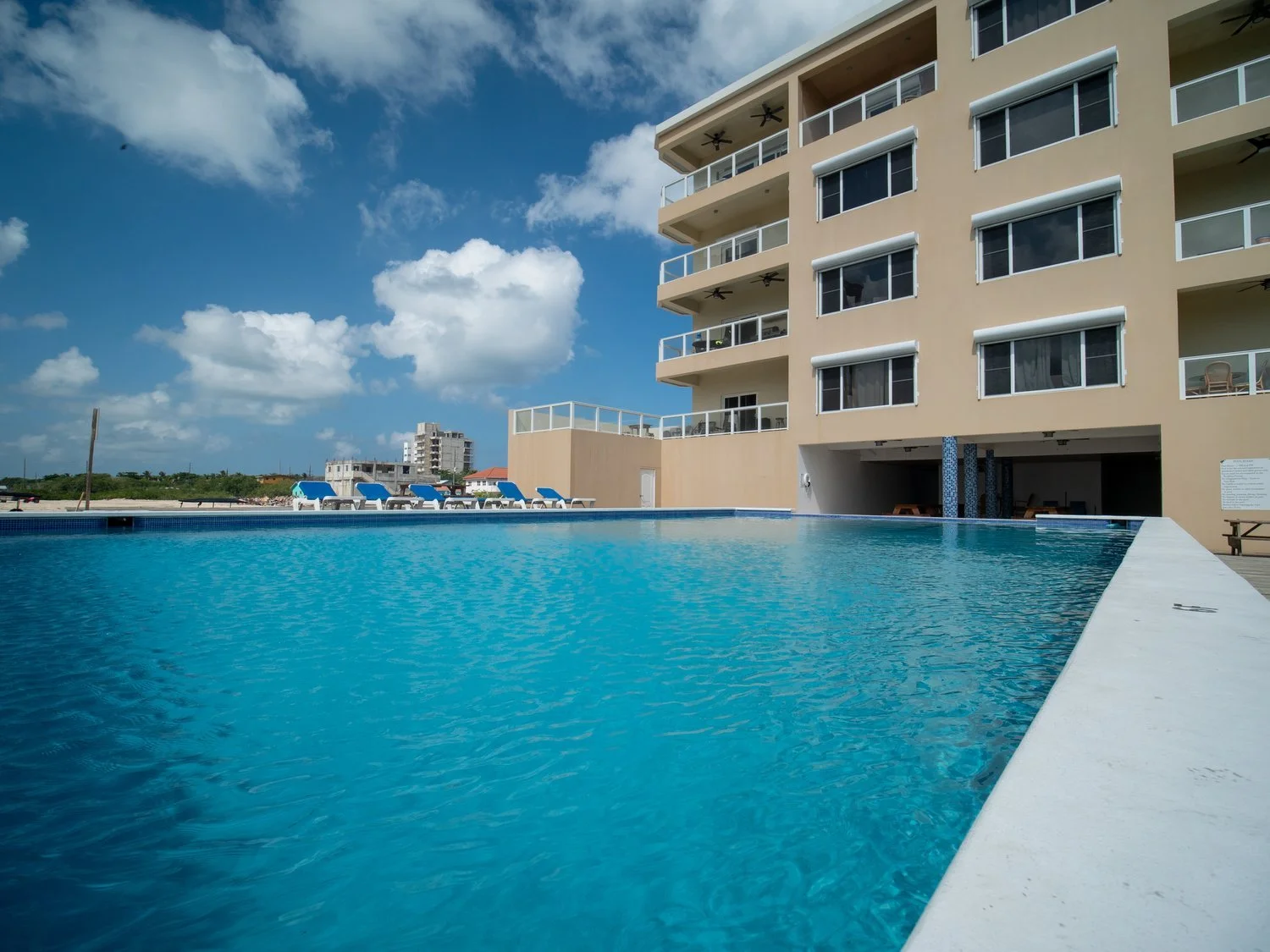 One of two units with a private garage and driveway. Custom murals throughout.

Coconuts Blue's the 5th-floor unit with the garage and driveway setup that almost nobody else has. Custom murals on three walls, reef views for sunrise, mangrove views fo