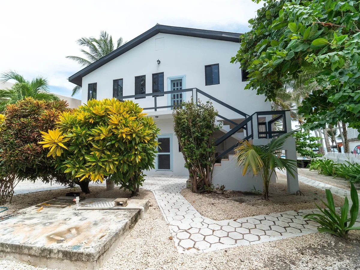Price Improvement!! Three rental units on Tres Cocos beachfront. Walk to everything.

Pebble Beach Home sits on 80 x 160 feet of beach with three separate rental units plus caretaker's quarters. Private pool, 45,000-gallon cistern, brand new AC throu