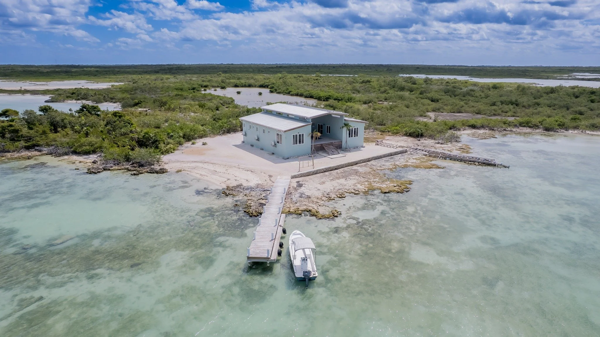 186 feet of beachfront. A boat included. And the only way to get there is by water.

Casa Kline sits 2 miles north of Secret Beach on the west side of Ambergris Caye, boat access only. New construction, completed in 2024, fully furnished and ready to