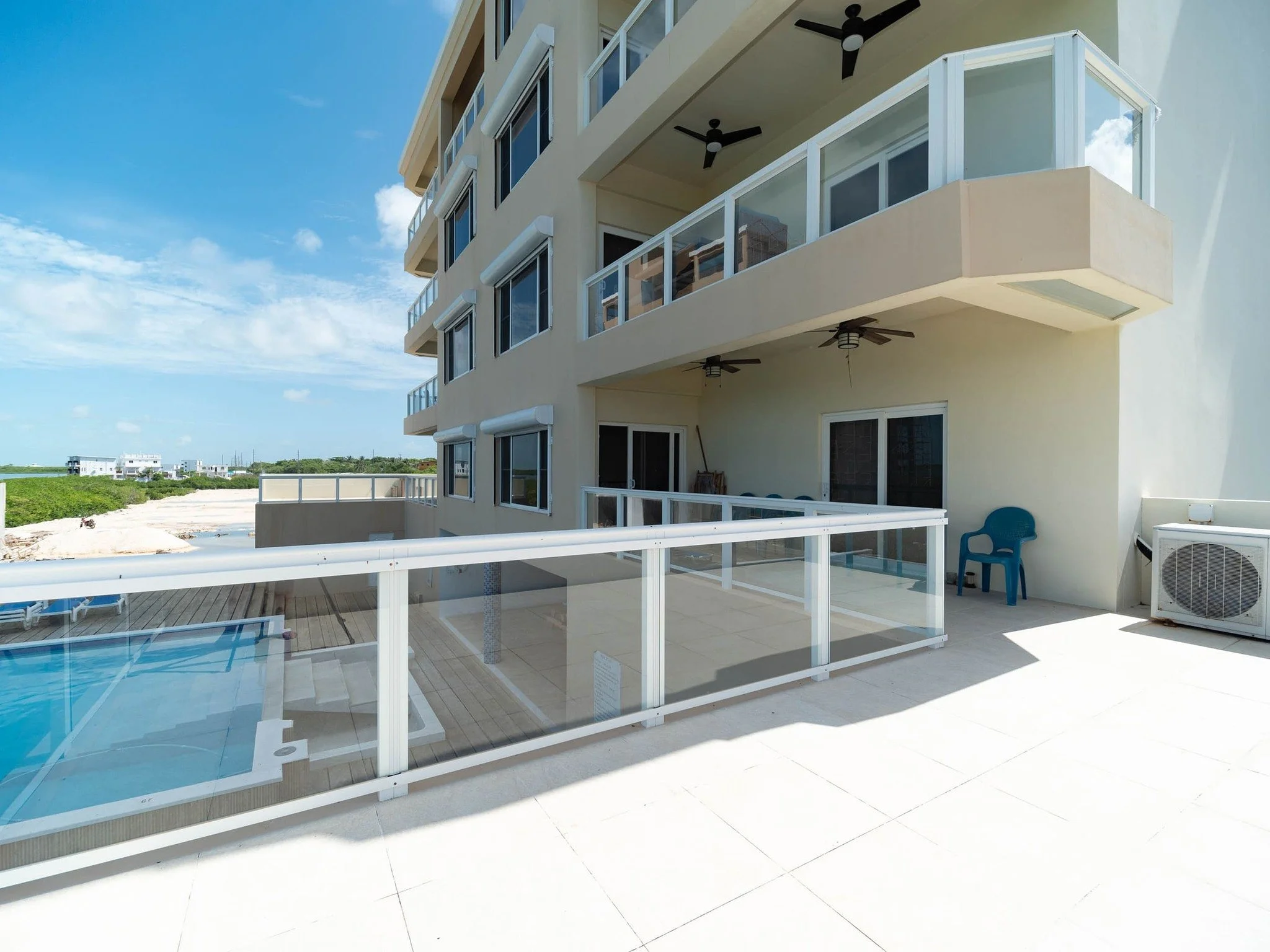 One mile north of the bridge is a particular kind of convenient. You're clear of the noise of town but a short golf cart ride from restaurants, the beach bars, and the water taxi. Coconuts Caribe sits right at that balance point, and unit 204 is a se