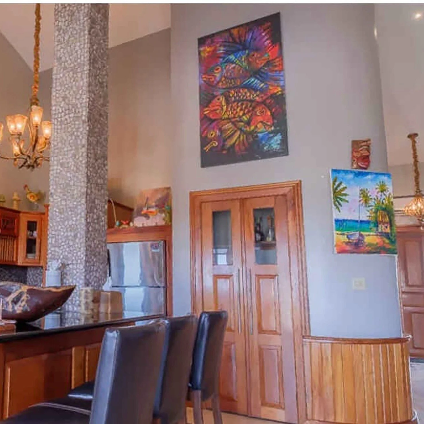 The 4th-floor penthouse at Oceans 23 &mdash; a 23-unit beachfront community 3.5 miles north of San Pedro. The complex was originally Captain Morgan's; it's been fully reimagined as private residences, and this unit has had meaningful upgrades in the 