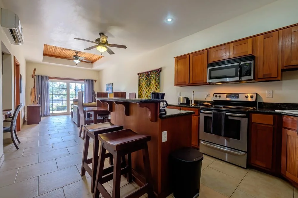 Two hundred yards north of the bridge puts you close enough to walk to most of what San Pedro has going on. The Truck Stop, Rain Rooftop, Crocs, the produce market &mdash; none of it requires a golf cart from here. That kind of proximity at this pric