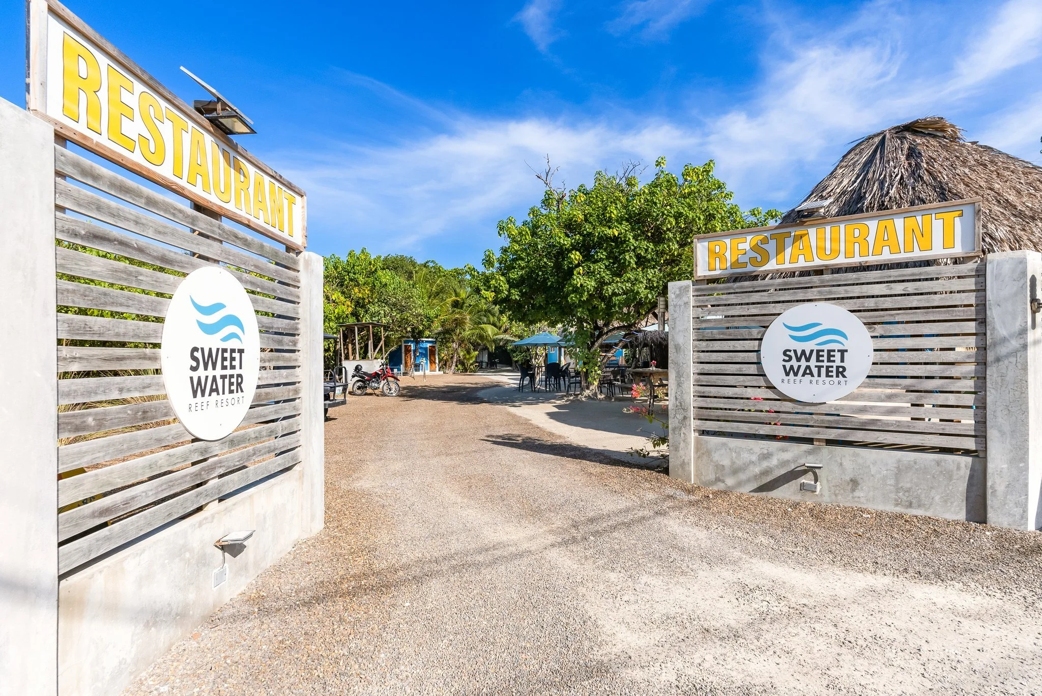 There's a version of owning a beachfront boutique resort property where you show up and everything is already working. Sweet Water Reef Resort is that version.

Beachfront. Fully furnished. Five rentable units, an on-site restaurant and bar, and a do