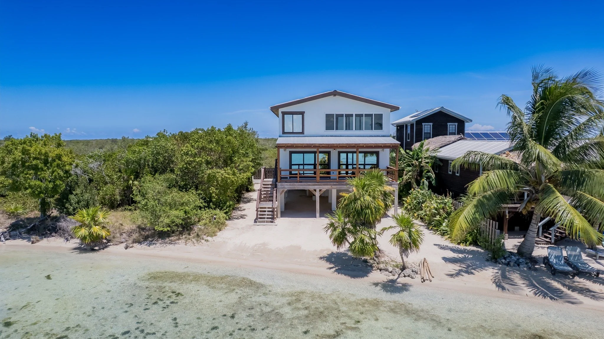 The kind of Secret Beach compound that holds a full family at Christmas, and holds up just fine when nobody's there in September.

Finished in 2023 directly on the beach, this 3-bedroom, 4-bath sleeps 10 across the kind of layout that handles holiday