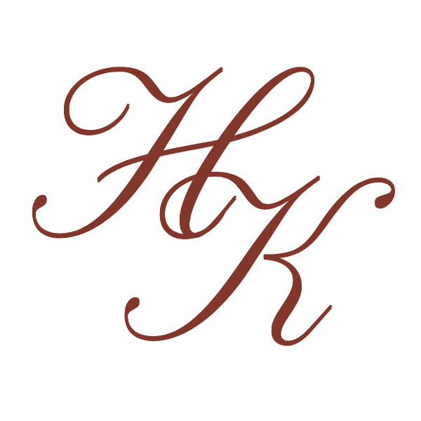 Elegant cursive initials HJ and K in brown on a black background.
