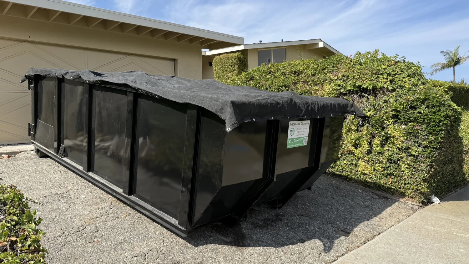 Sustainable Cleanouts 17 yard roll off dumpster ready for customer loading