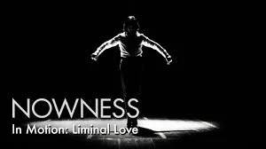 Silhouette of a person with arms outstretched in a dark setting, with text that reads 'NOWNESS In Motion: Liminal Love'.