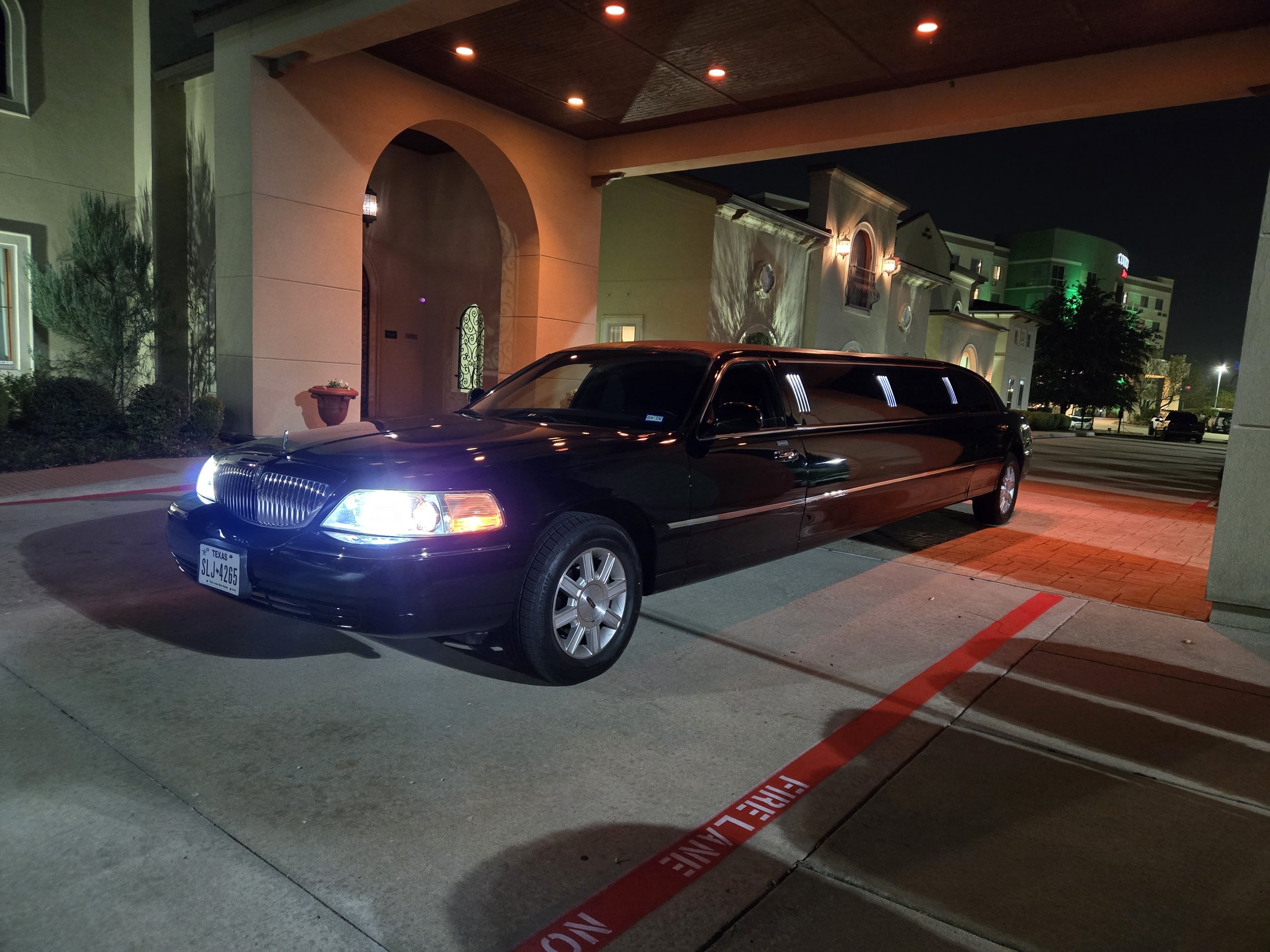 Black Stretch limousine at Chapel at Ana Villa
