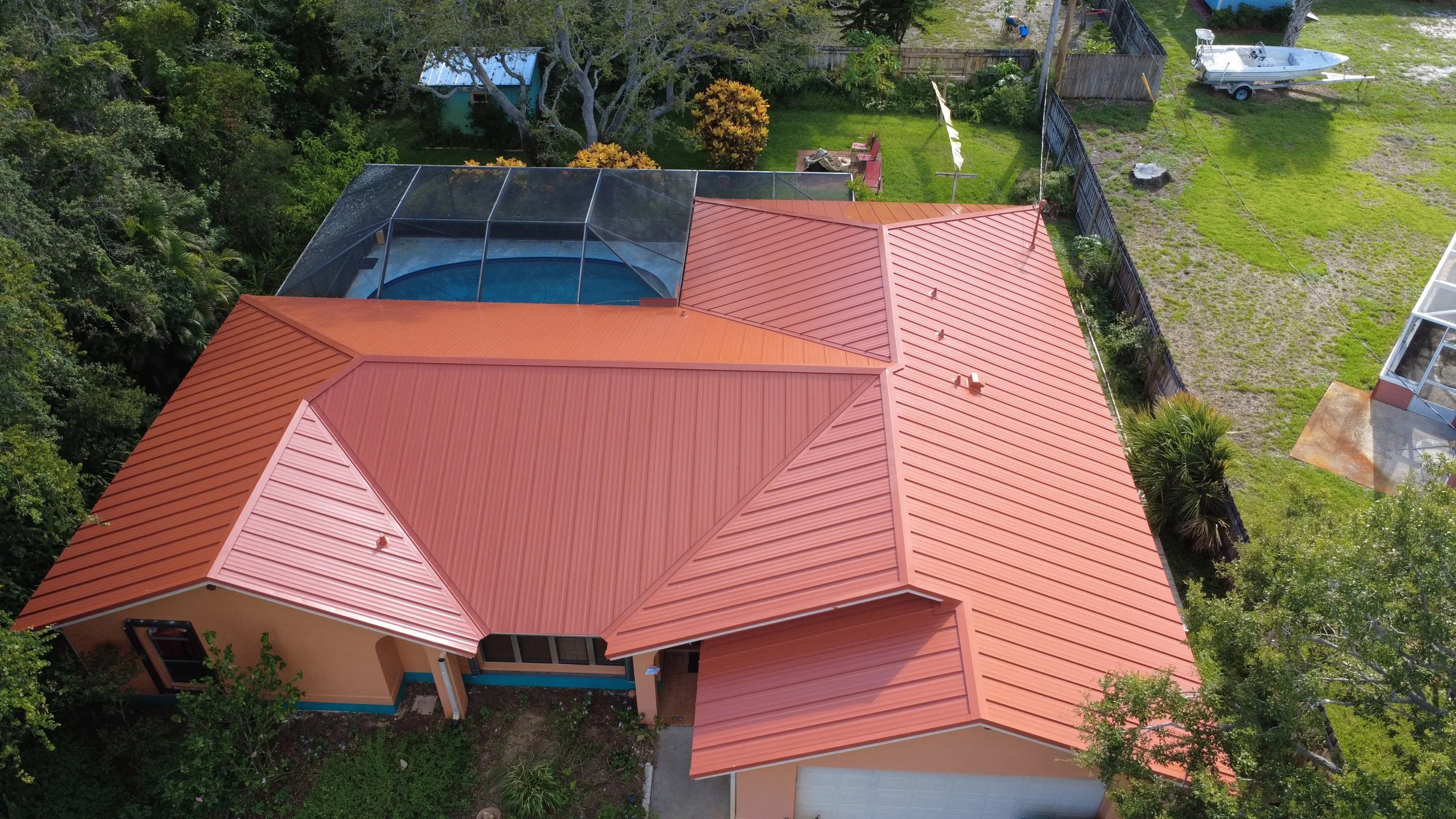 Reputation_Roofing_Serving_Florida_Roof_Replacements_Repairs_Terracotta standing seam 24 gauge -5.jpg
