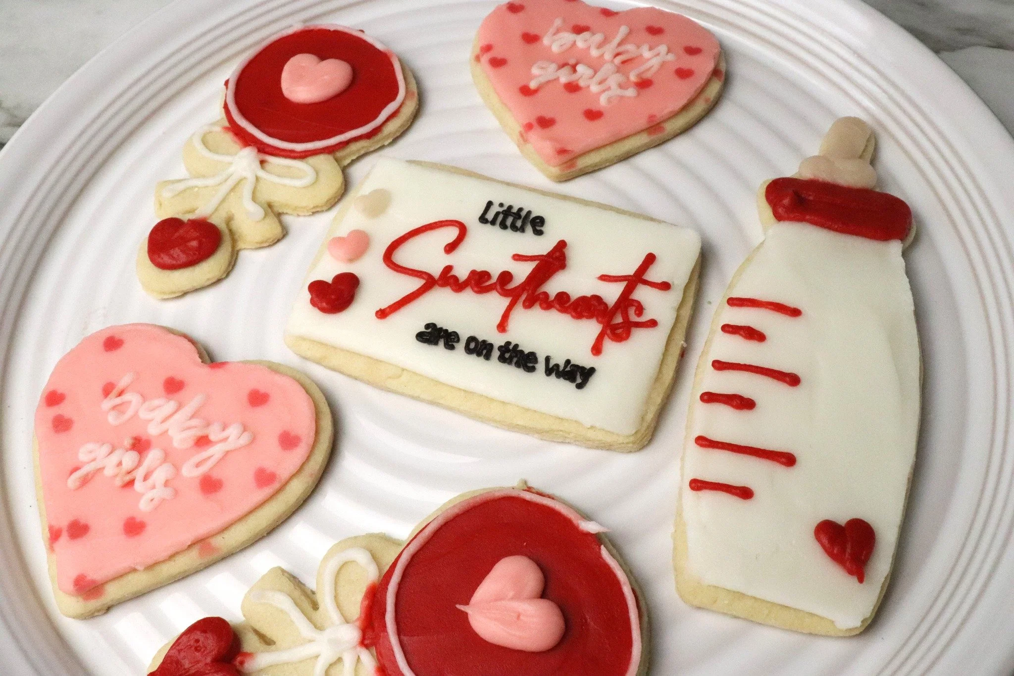 Valentine&rsquo;s energy all month long 💗

Still obsessing over this set.

Custom cookies make every celebration feel a little more magical ✨

 #valentinesdaycookies #babyshowercookies #alittlesweetheartontheway #shoplocalmhk