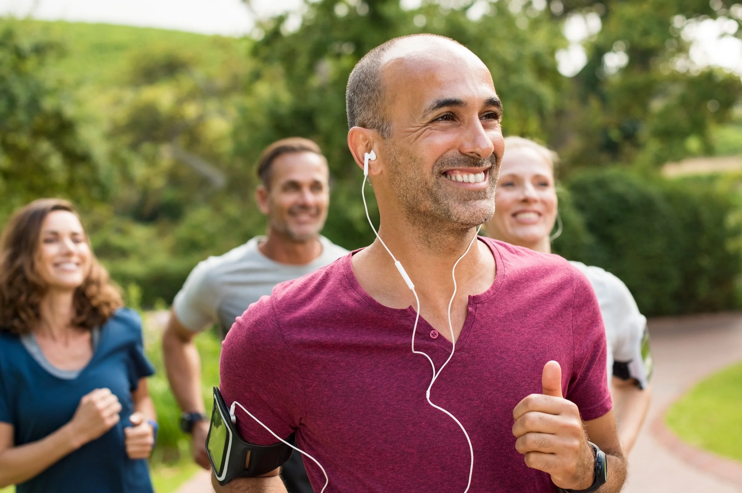 Group of adults running together