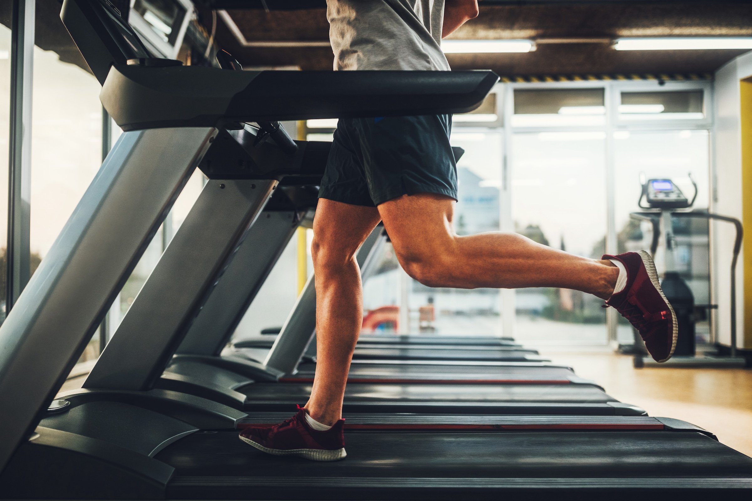man running on treadmill