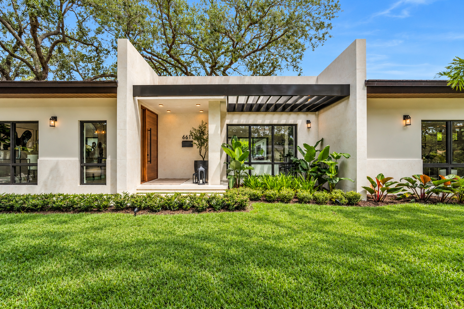 Modern Tropical Home with Lush Landscaping.png