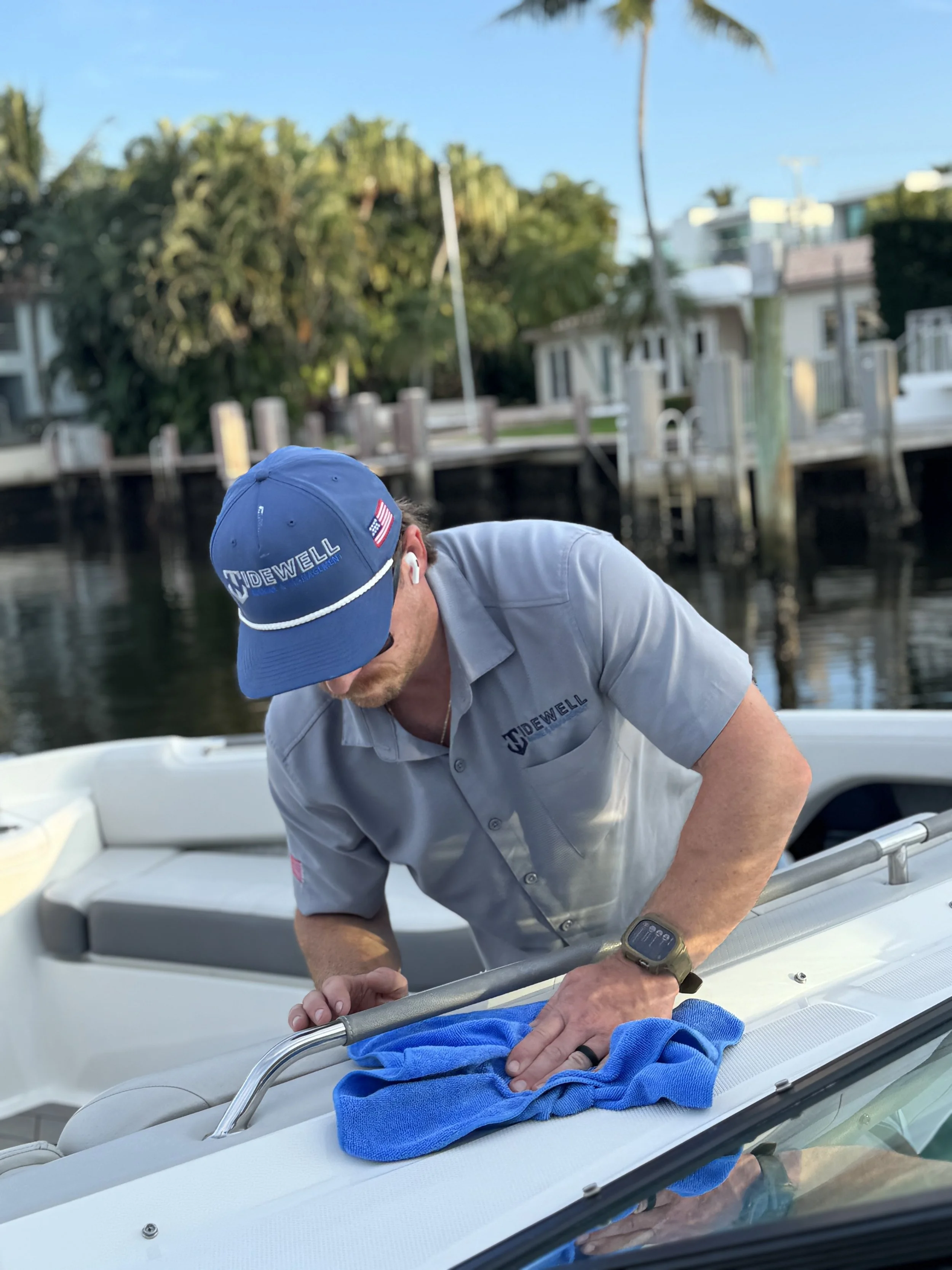Tidewell Marine technician detailing a boat hull