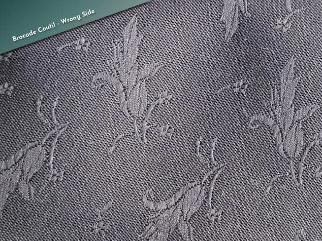 Wrong side of black floral coutil fabric for corset making