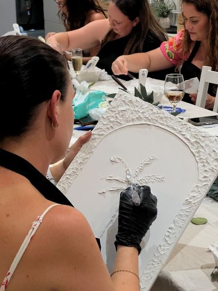Lady creating textured art