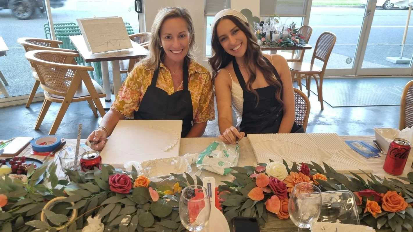 Mun and daughter at textured art workshop