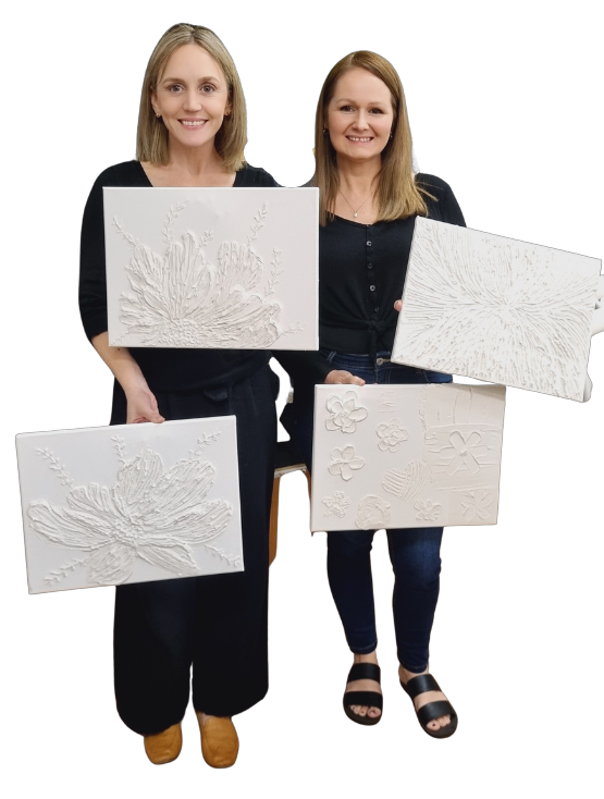 Ladies holding textured art