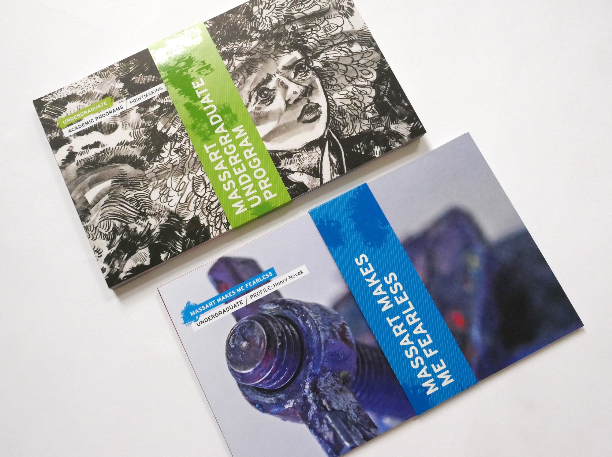 Modular postcards are grouped by category and held together with a belly-band.
