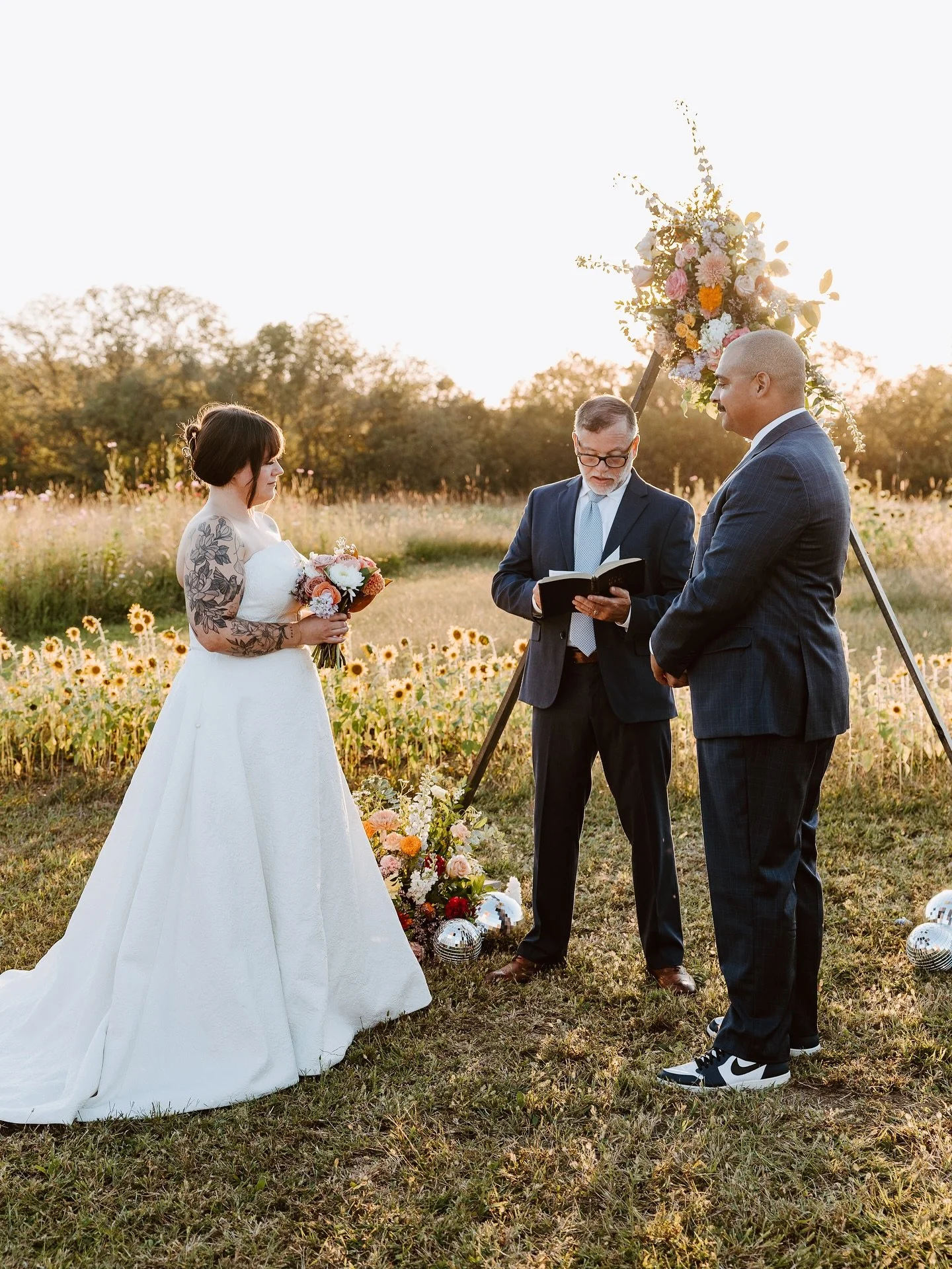 Golden hour never looked so good.

 This sunset wedding at the Louisburro Flower Farm @thelouisburroflowerfarm was pure magic &mdash; rows of blooms, a glowing sky, and a couple whose joy outshone the light itself. Outdoor Kansas weddings don&rsquo;t