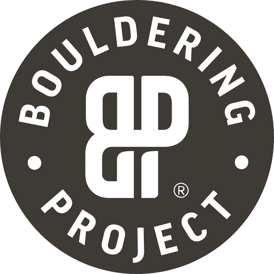 Black circular logo with the words "BOULDERING PROJECT" encircling a stylized monogram of the letters B and P in the center.