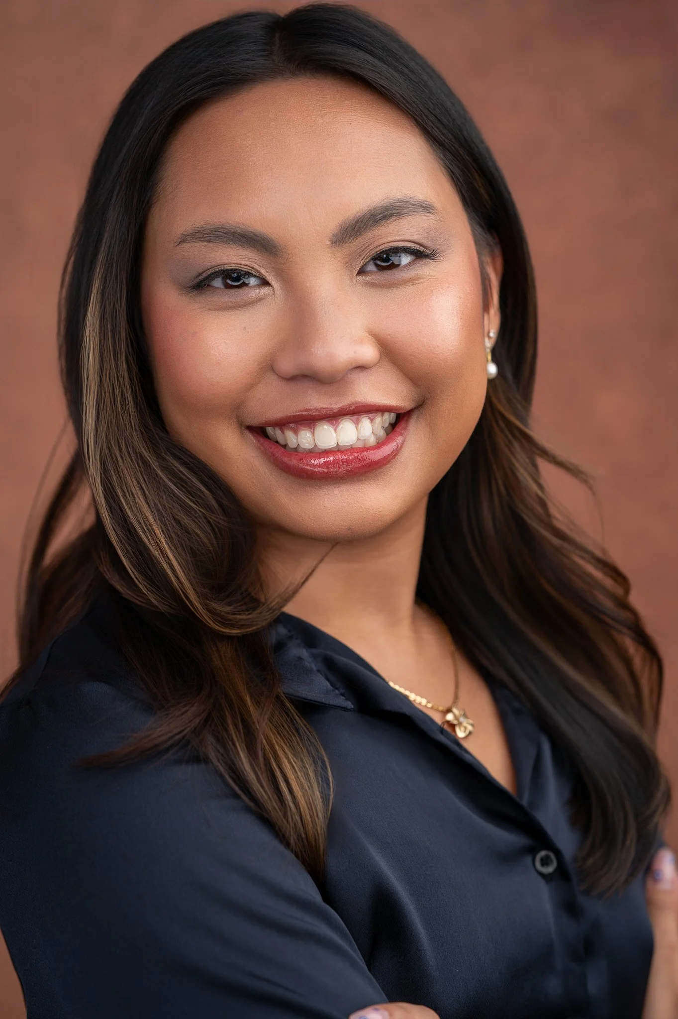  Professional Headshot With Warm Brown Background