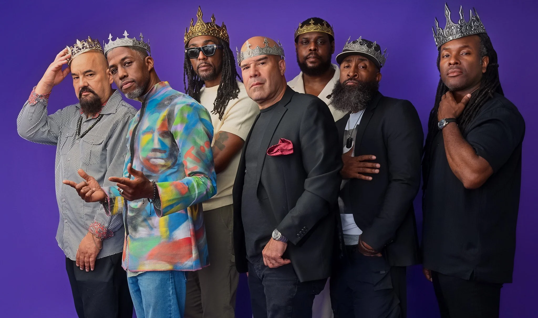 Group Portrait of Black and Hispanic Male Artists Wearing Crowns