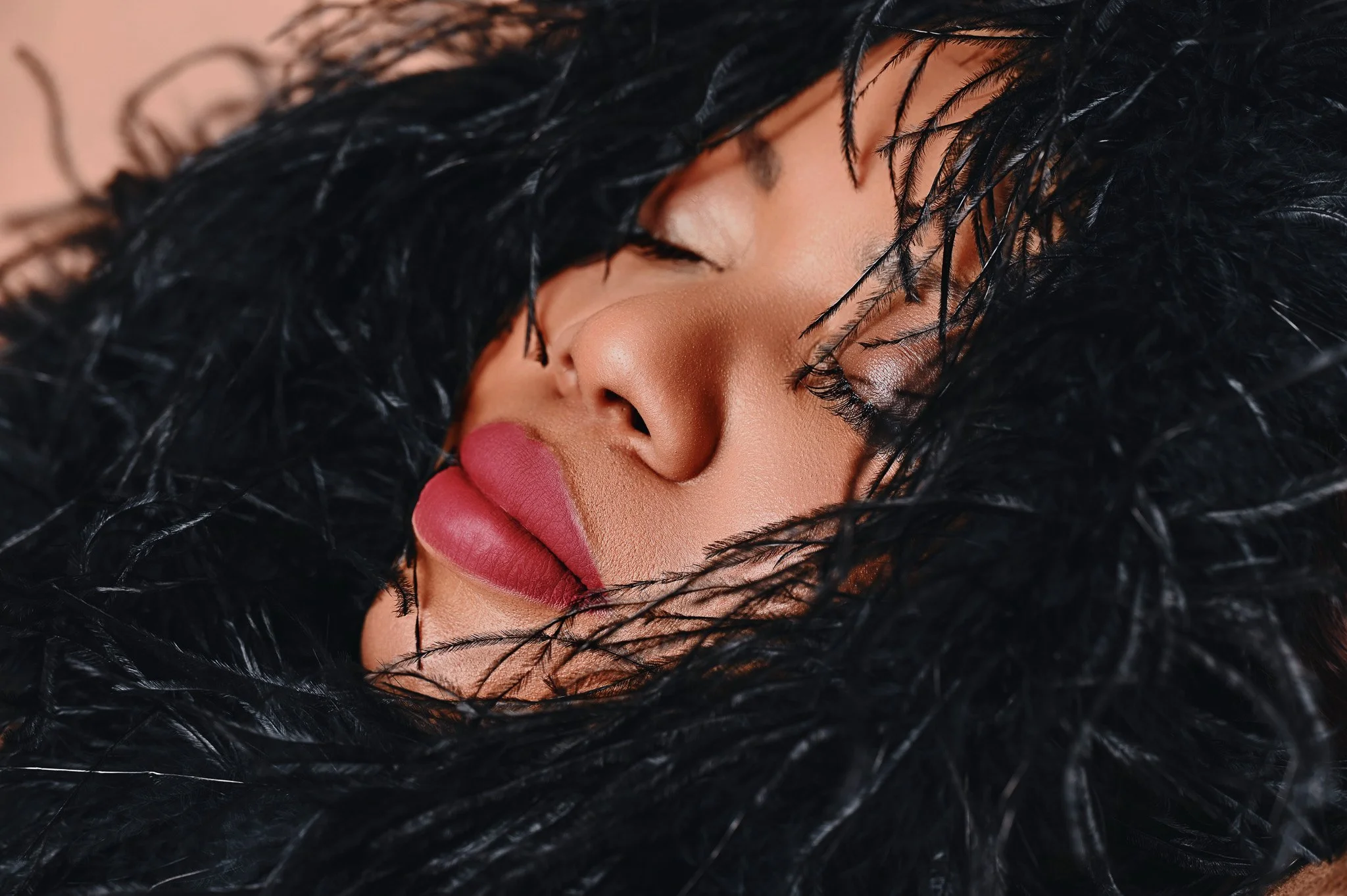 Fine Art Beauty Portrait in Black Feathered Texture