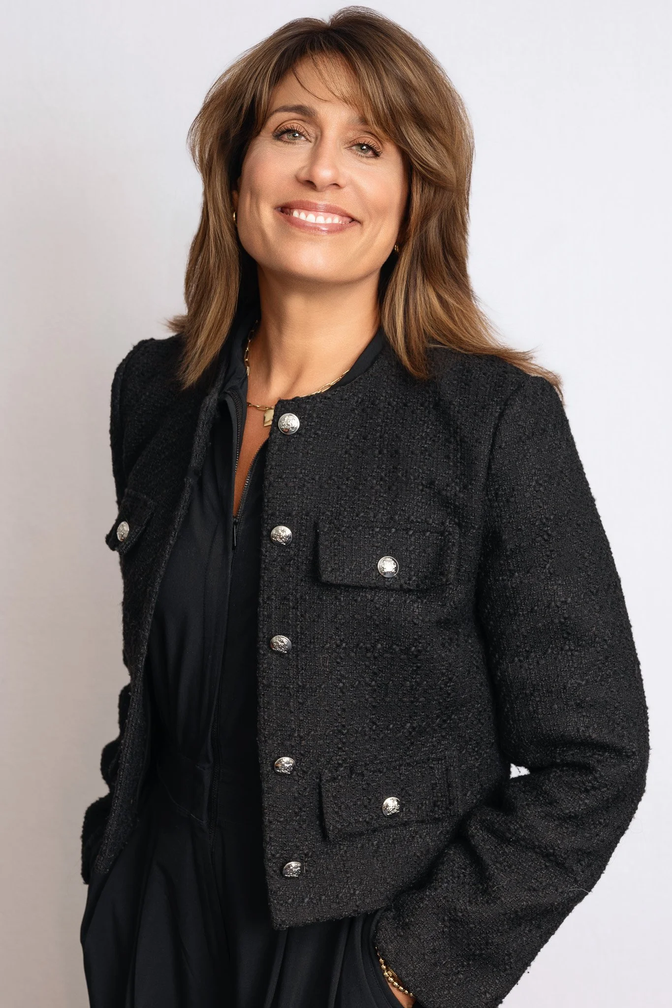 Elegant Professional Portrait of Woman in Black Textured Jacket