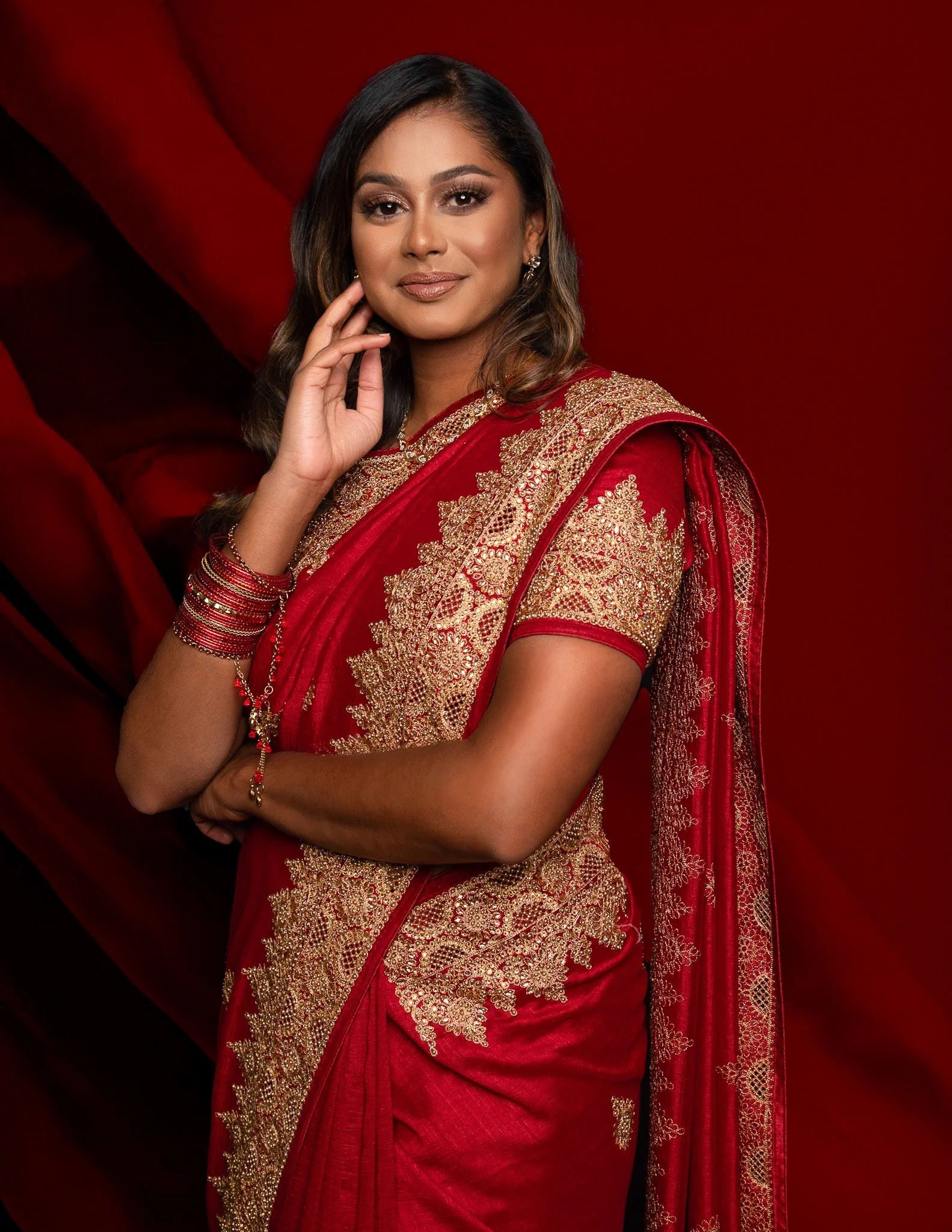 Traditional Portrait in Red and Gold Saree