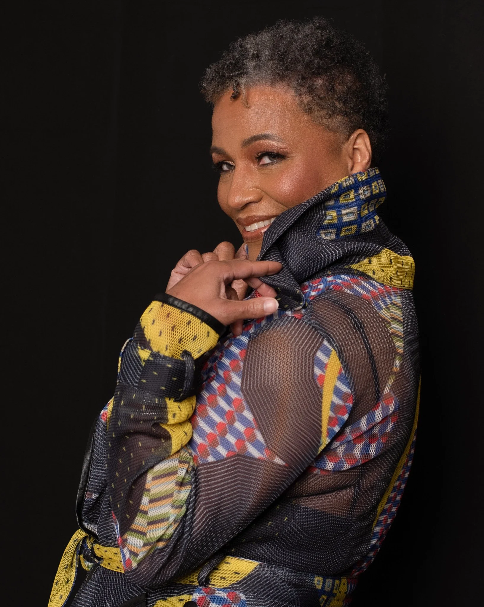 Modern Studio Portrait in Colorful Mesh Jacket