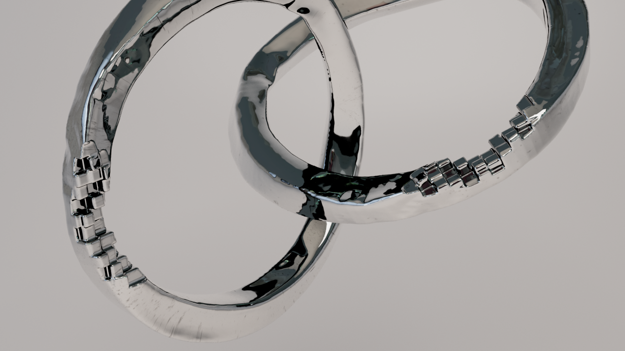 二つのシルバーの結婚指輪のアップ画像