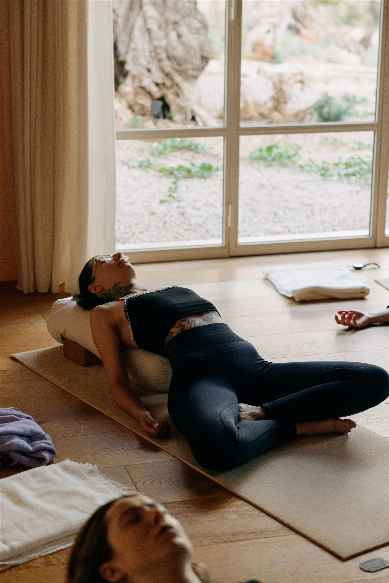Women relaxing doing yoga