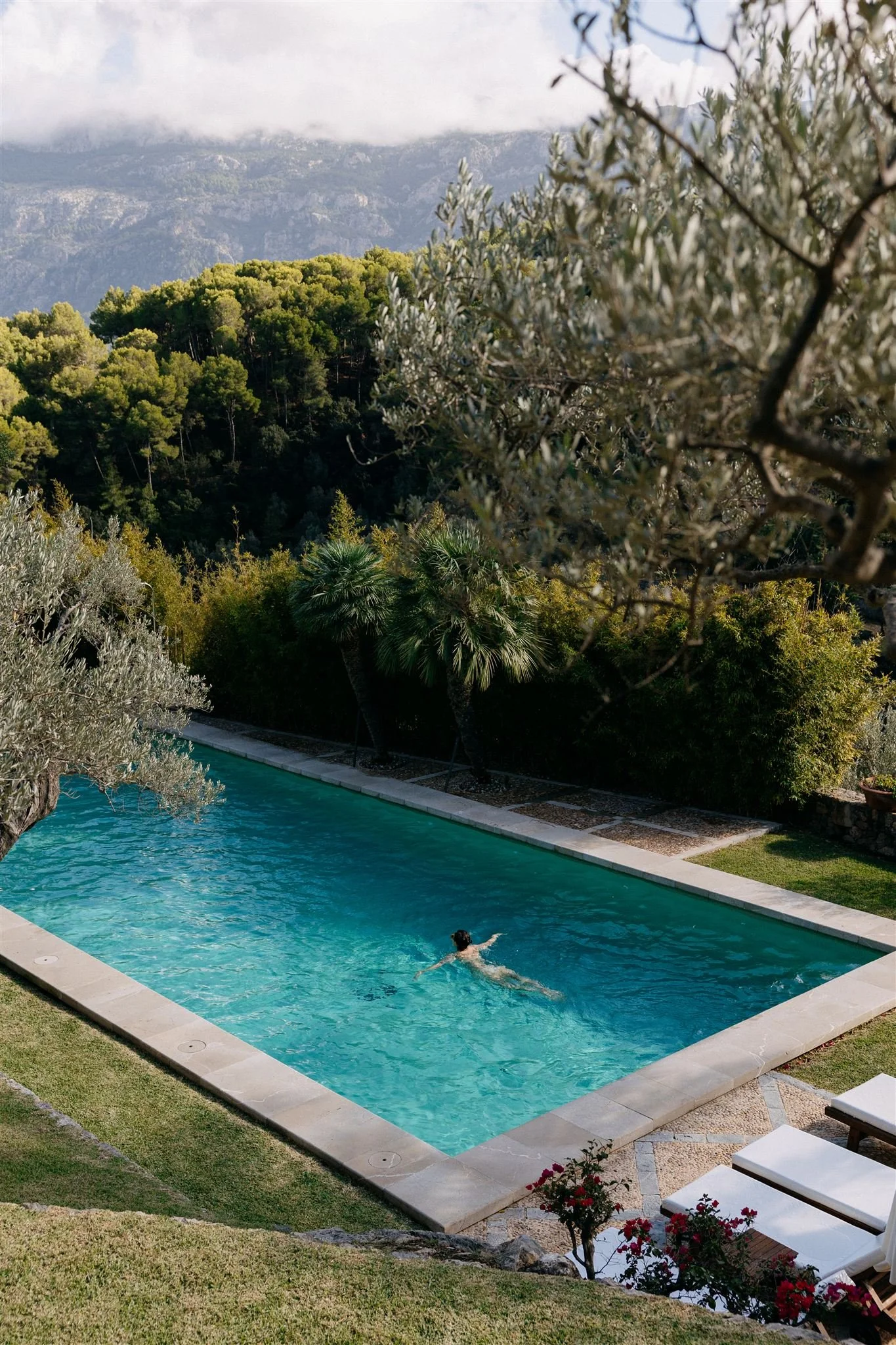 woman swimming in pool at finca son salas soller mallorca