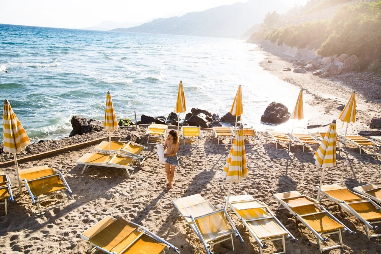 yellow beach chairs on the beach.jpeg