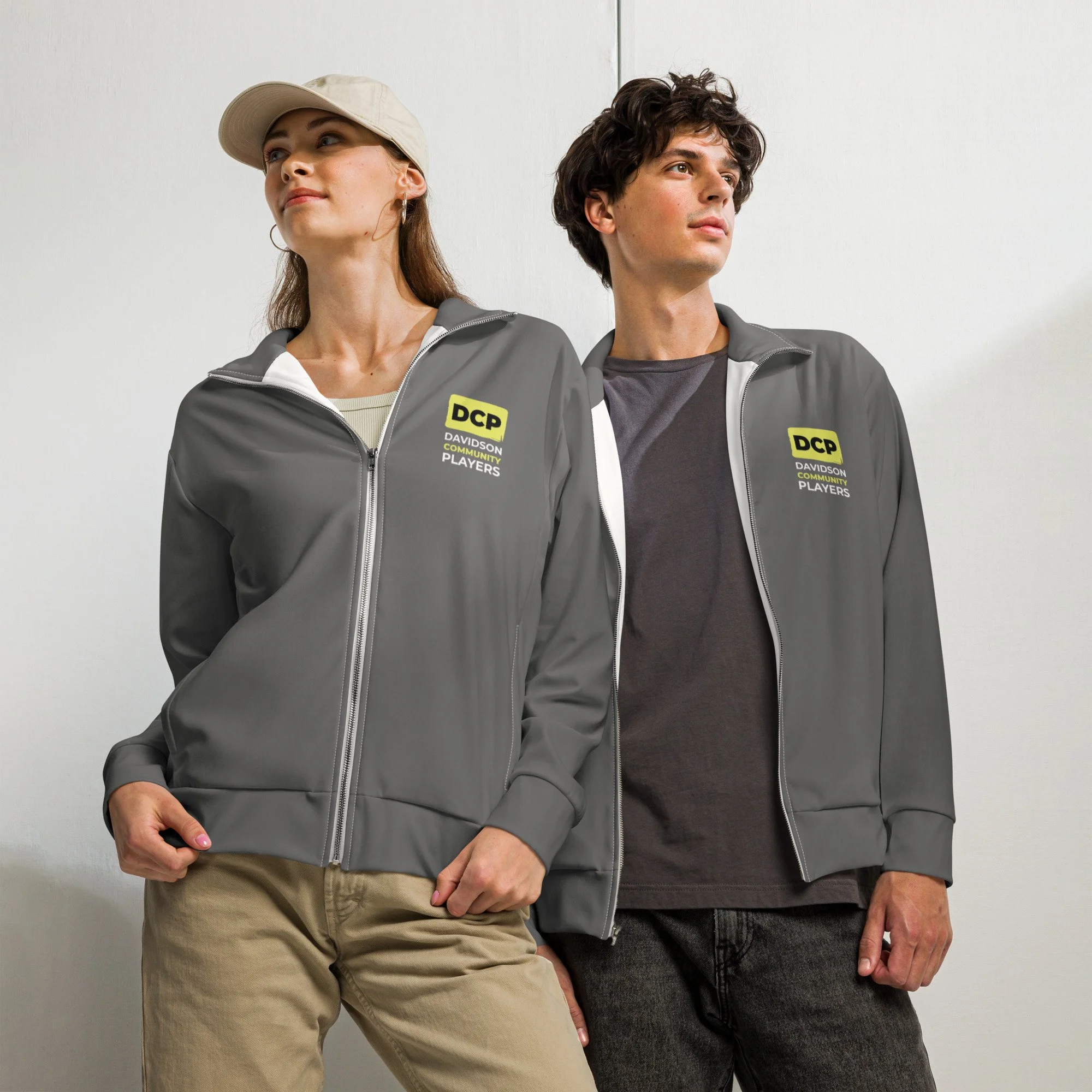 Two models in gray track jackets