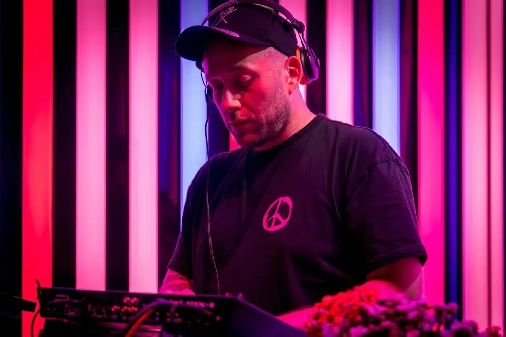 A photo of artist Natural Symphony playing live.