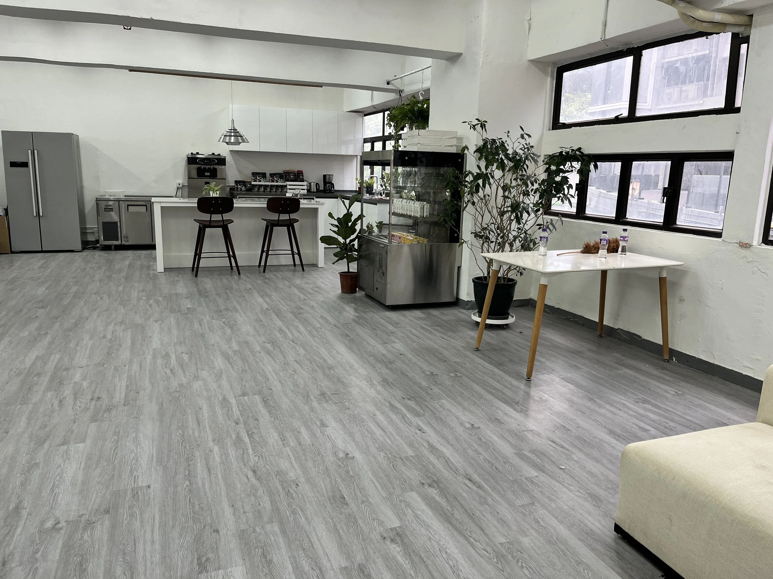 Modern kitchen space with large island counter at The Hang, perfect for university society cooking workshops and social gatherings.