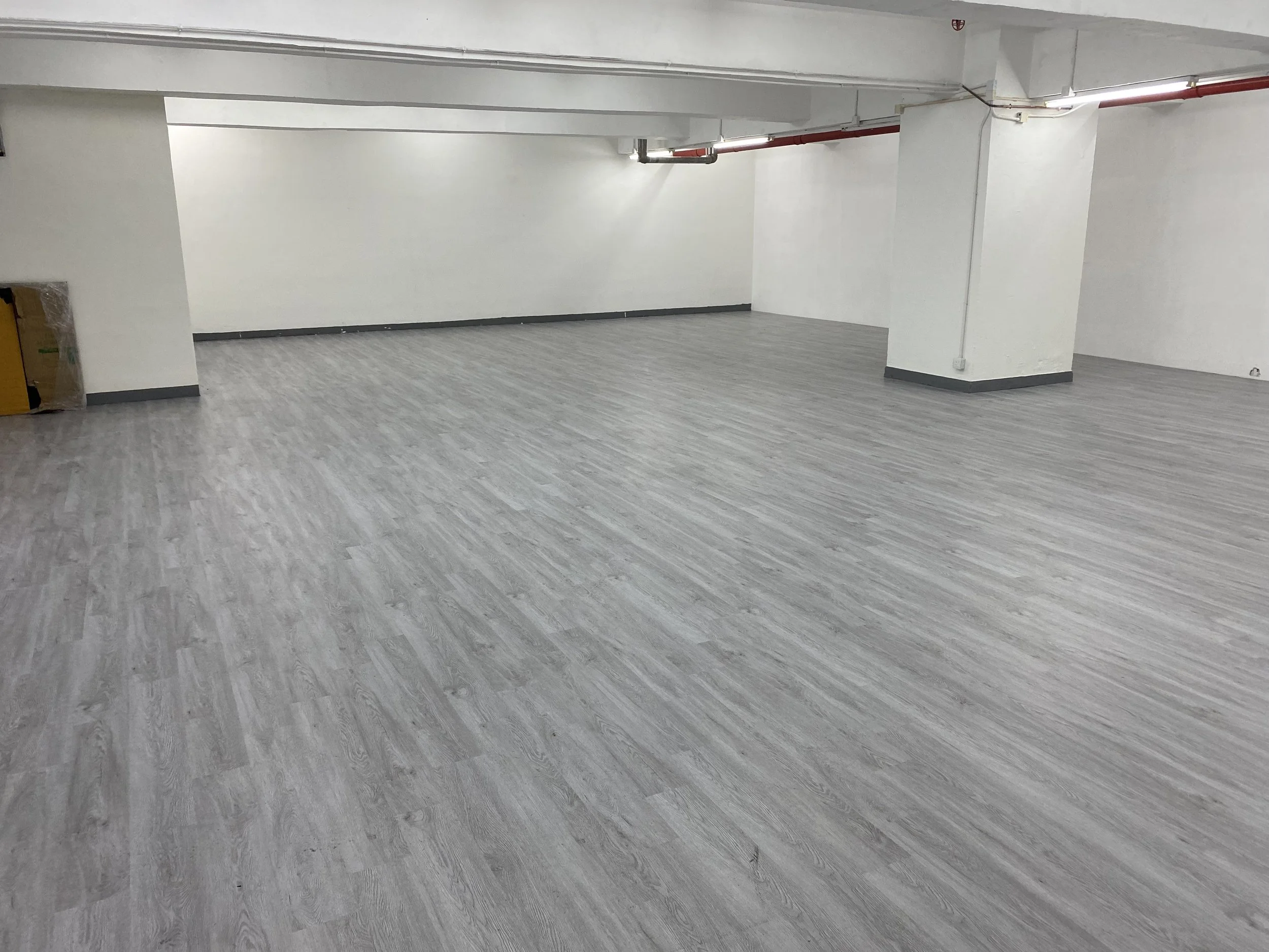Wide open 2,200 square feet room layout at The Hang, set up for university orientation camp mass games.