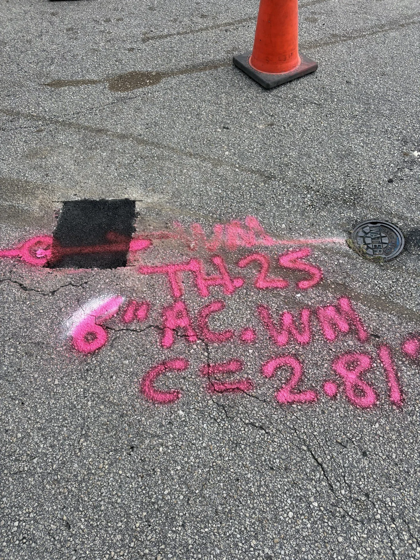 Asphalt repair and pinning after successful utility potholing.