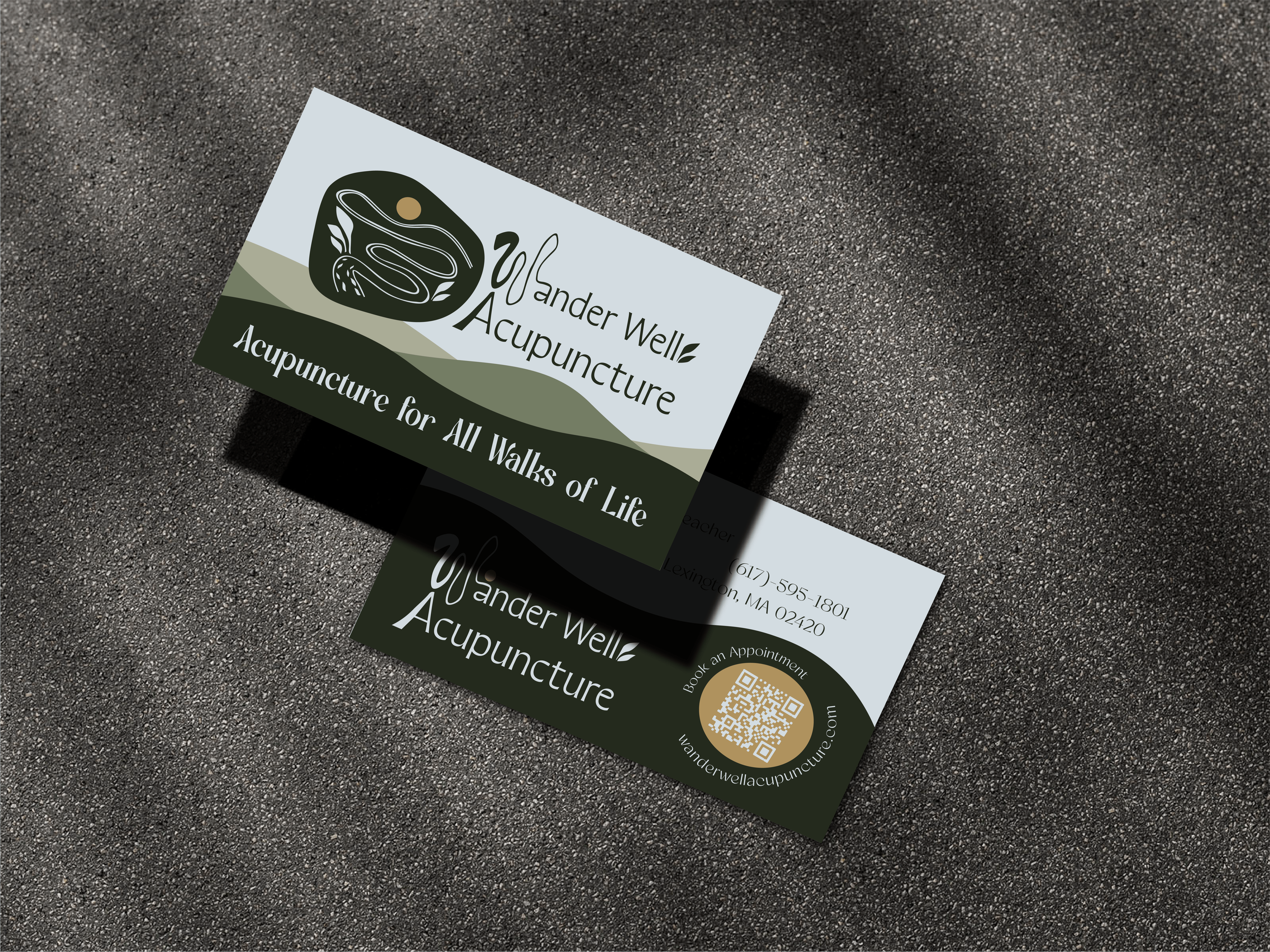 Wander Well Acupuncture Business Cards. The front is shown on the top business card, which casts a shadow over a second business card, showing the back of the design with a QR code to the website.