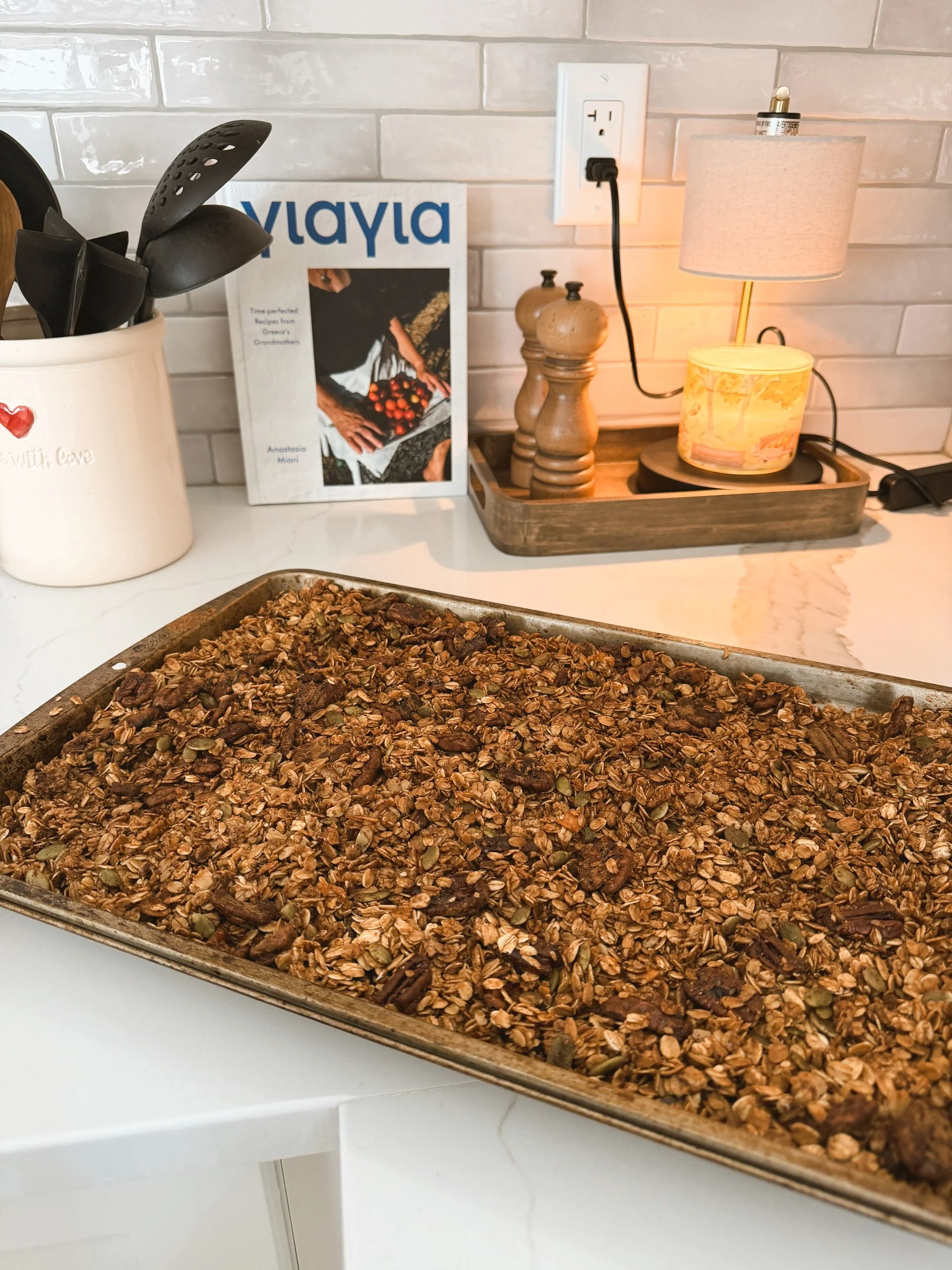 homemade granola in the sheet pan, fresh out of the oven