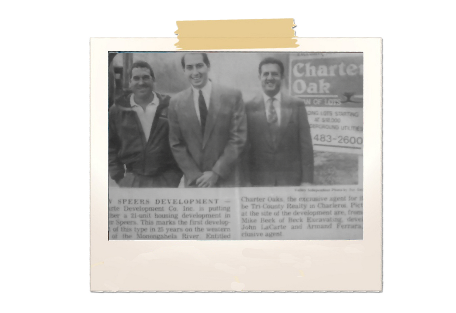 Three men standing near a Charter Oak sign in Speers, Pennsylvania.