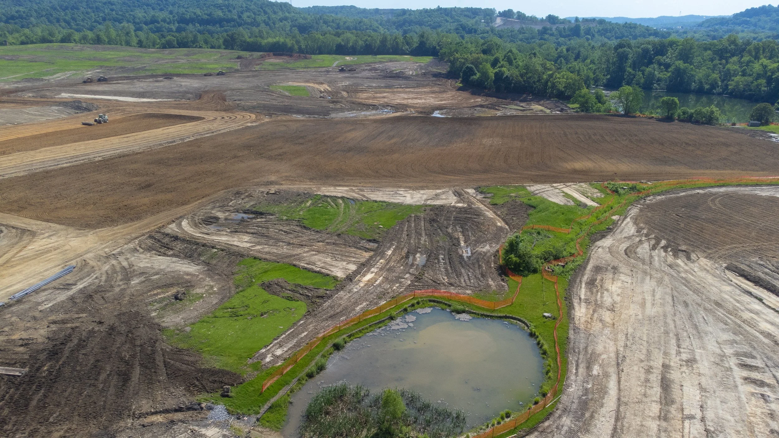 Overhead drone shot of a construction zone in Western Pennsylvania, taken by Ian Jones in Pittsburgh, showcasing industrial development and construction expertise by LaCarte Enterprises.