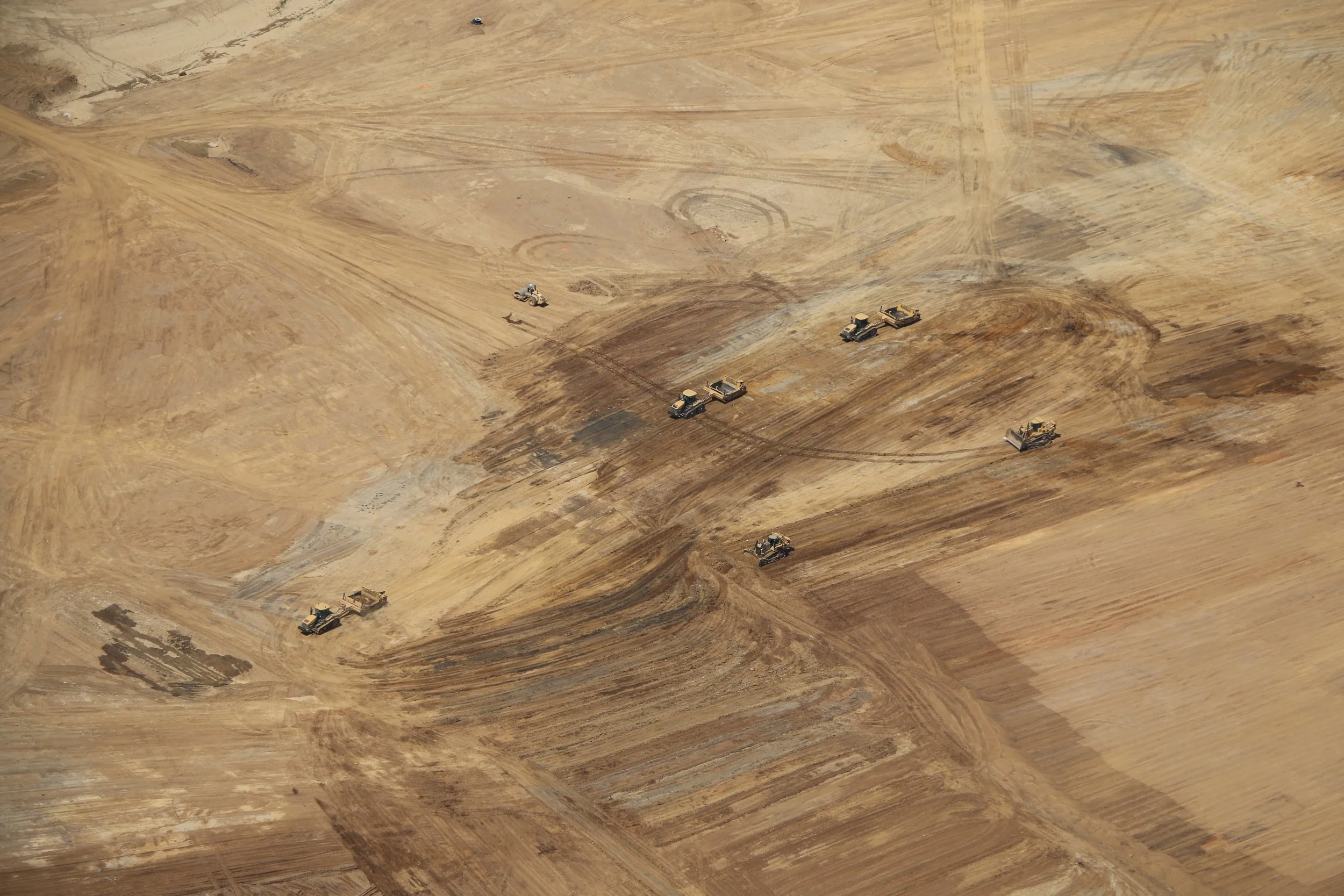 Overhead drone shot of a construction zone in Western Pennsylvania, taken by Ian Jones in Pittsburgh, showcasing industrial development and construction expertise by LaCarte Enterprises.