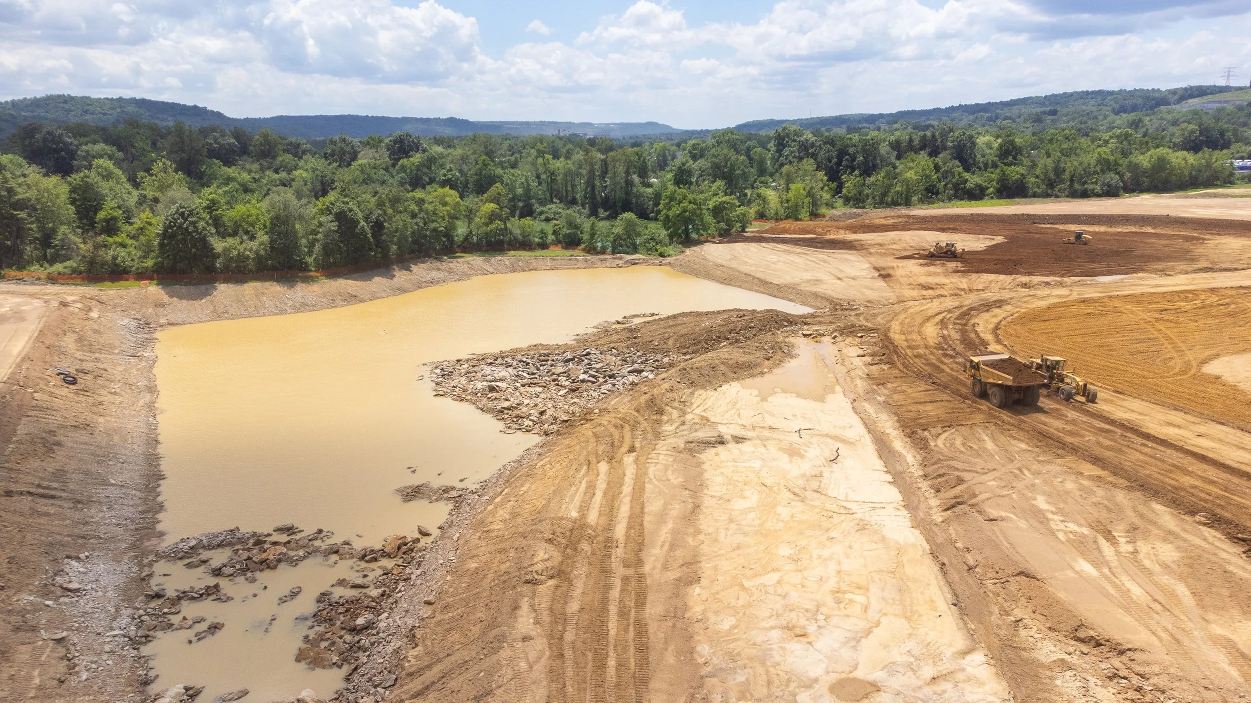 Overhead drone shot of a construction zone in Western Pennsylvania, taken by Ian Jones in Pittsburgh, showcasing industrial development and construction expertise by LaCarte Enterprises.
