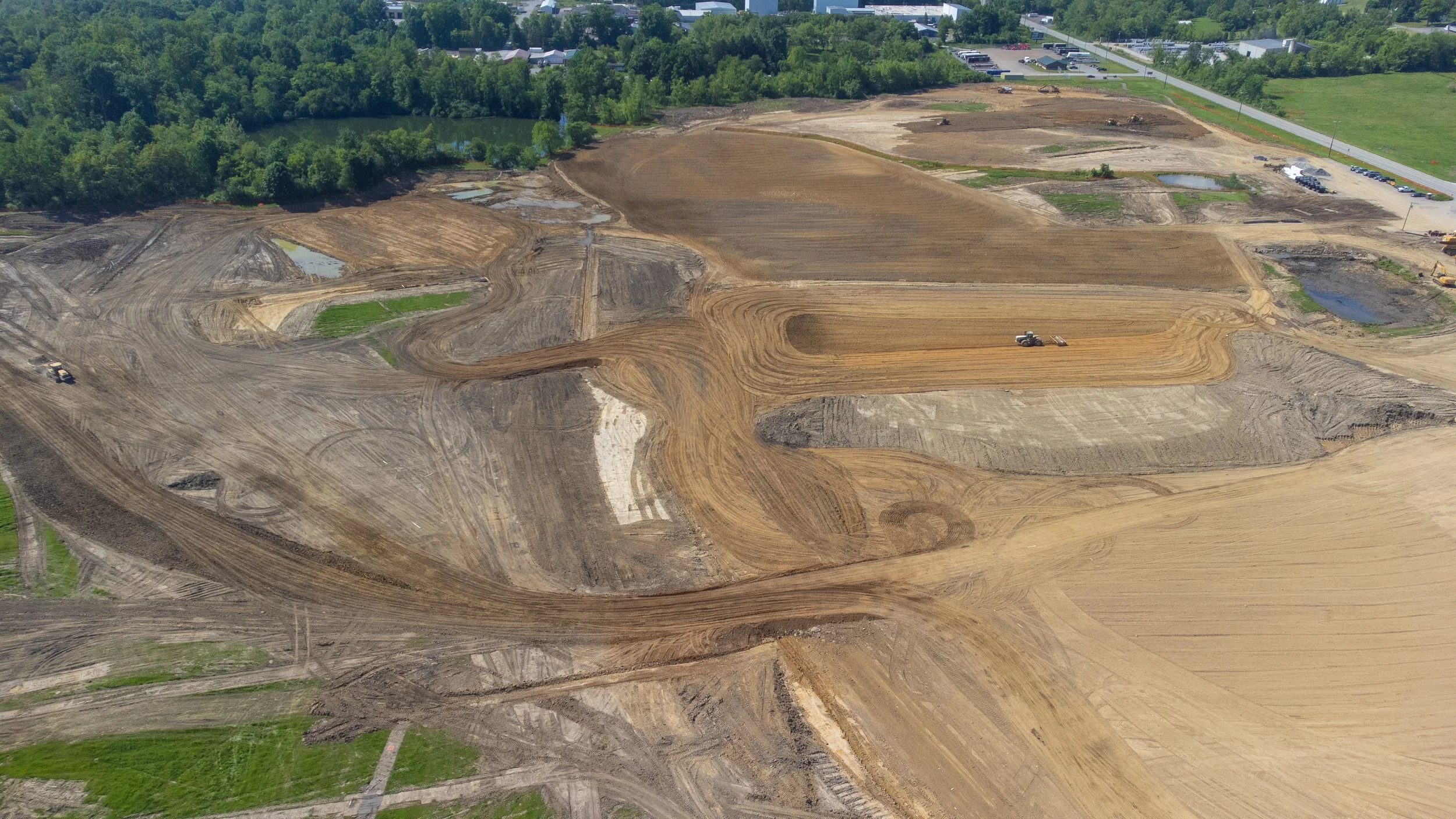 Overhead drone shot of a construction zone in Western Pennsylvania, taken by Ian Jones in Pittsburgh, showcasing industrial development and construction expertise by LaCarte Enterprises.