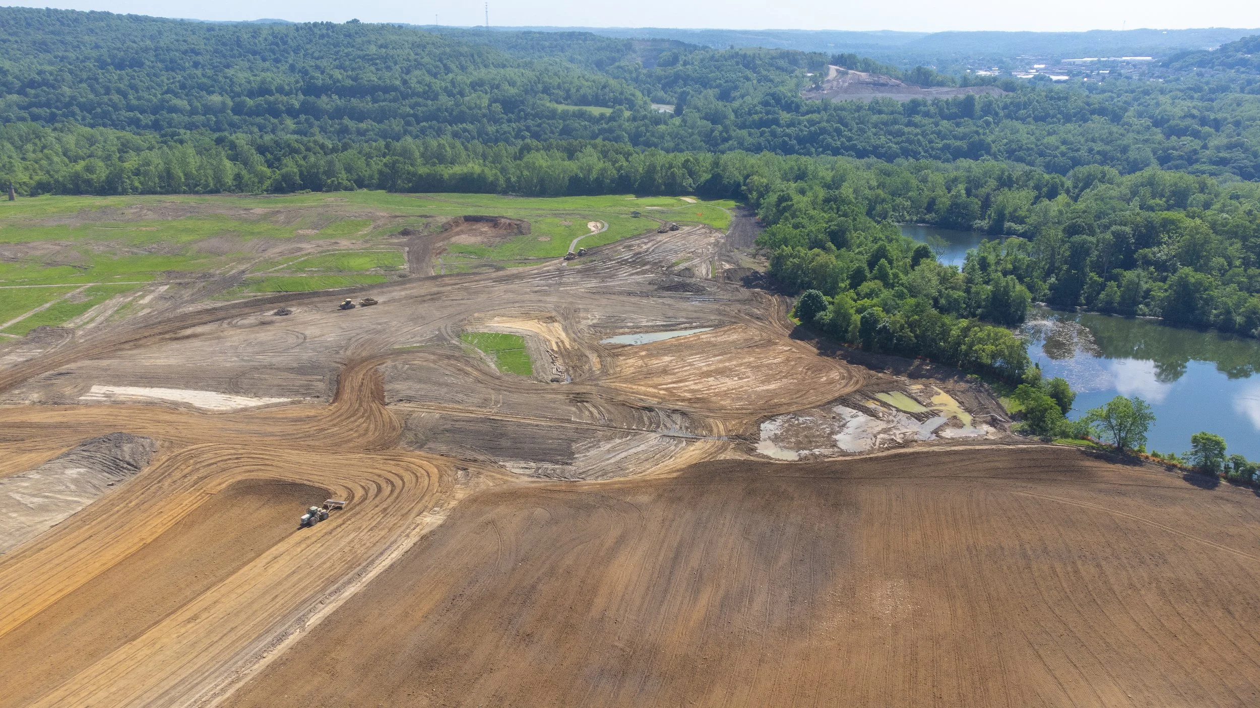 Overhead drone shot of a construction zone in Western Pennsylvania, taken by Ian Jones in Pittsburgh, showcasing industrial development and construction expertise by LaCarte Enterprises.